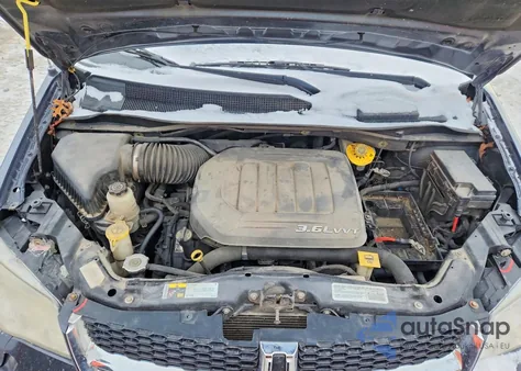 2014 Dodge Grand Caravan Sxt z USA, uszkodzony, nr VIN 2C4RDGCG7ER387799